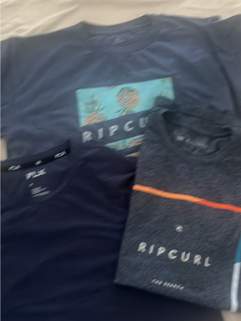 Back to school Bundle! (2) Rip Curl T’s (1) Navy blue workout T
